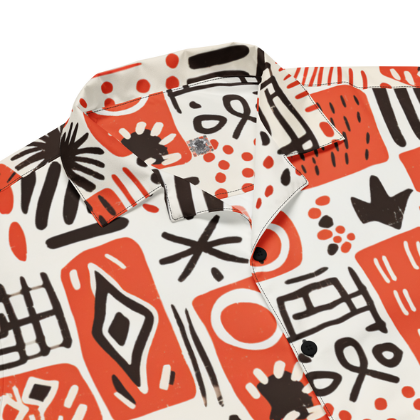 Image of the Ameru Camp shirt with striking Ameru print in deep orange, black, and white hues from Amerukhan Basics collection. Crafted with care, this button-up shirt blends tradition with contemporary style, offering comfort and sophistication. Laying flat.