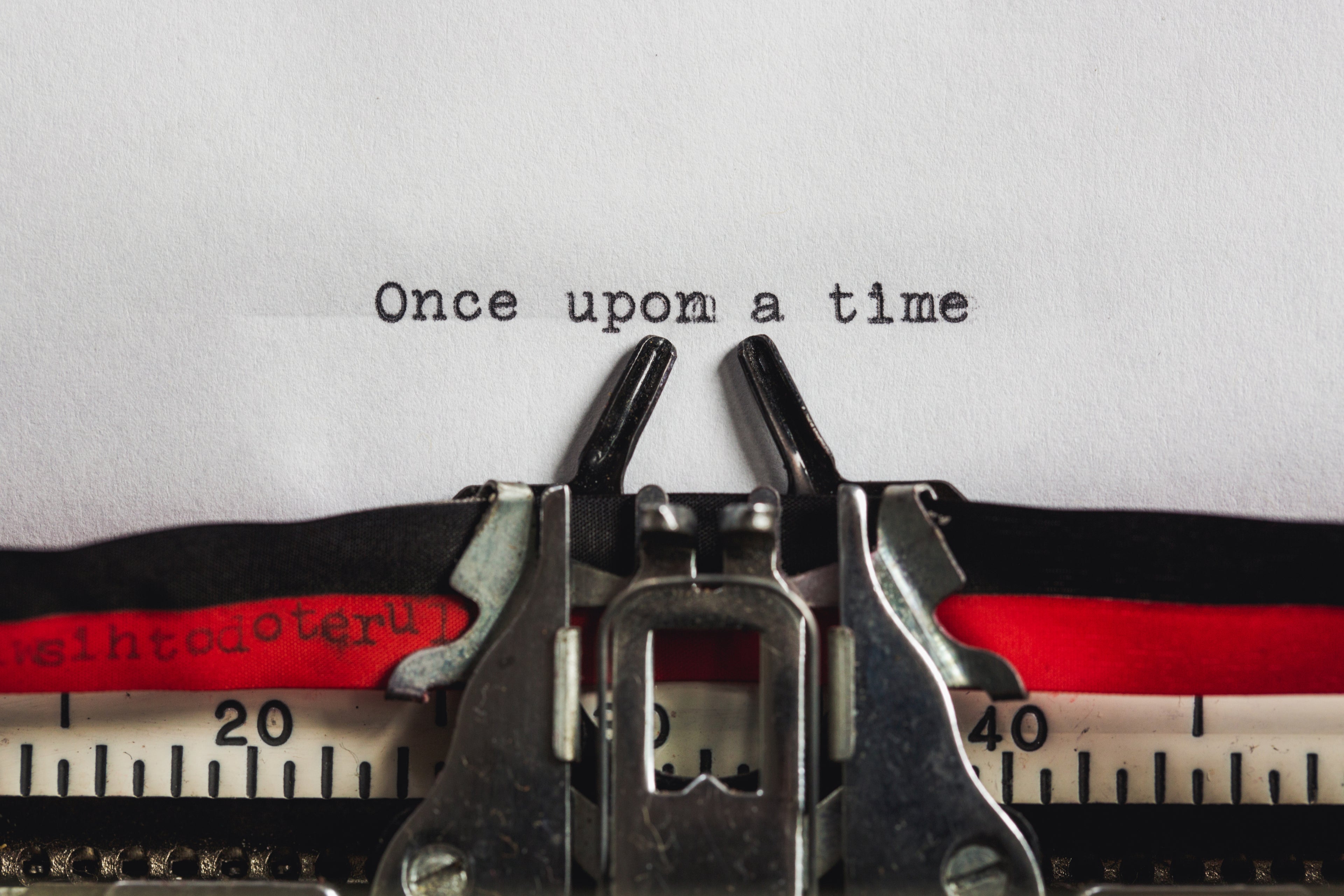 an image of a typewriter typing "Once upon a time"